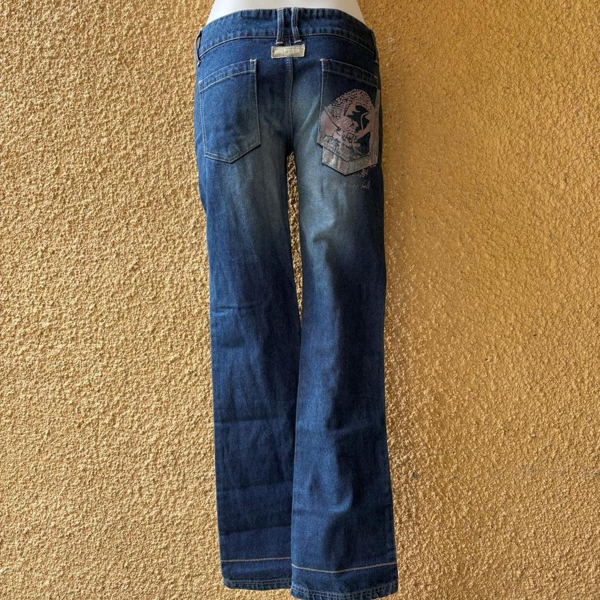 vintage 2000s y2k graphic low rise bootcut jeans