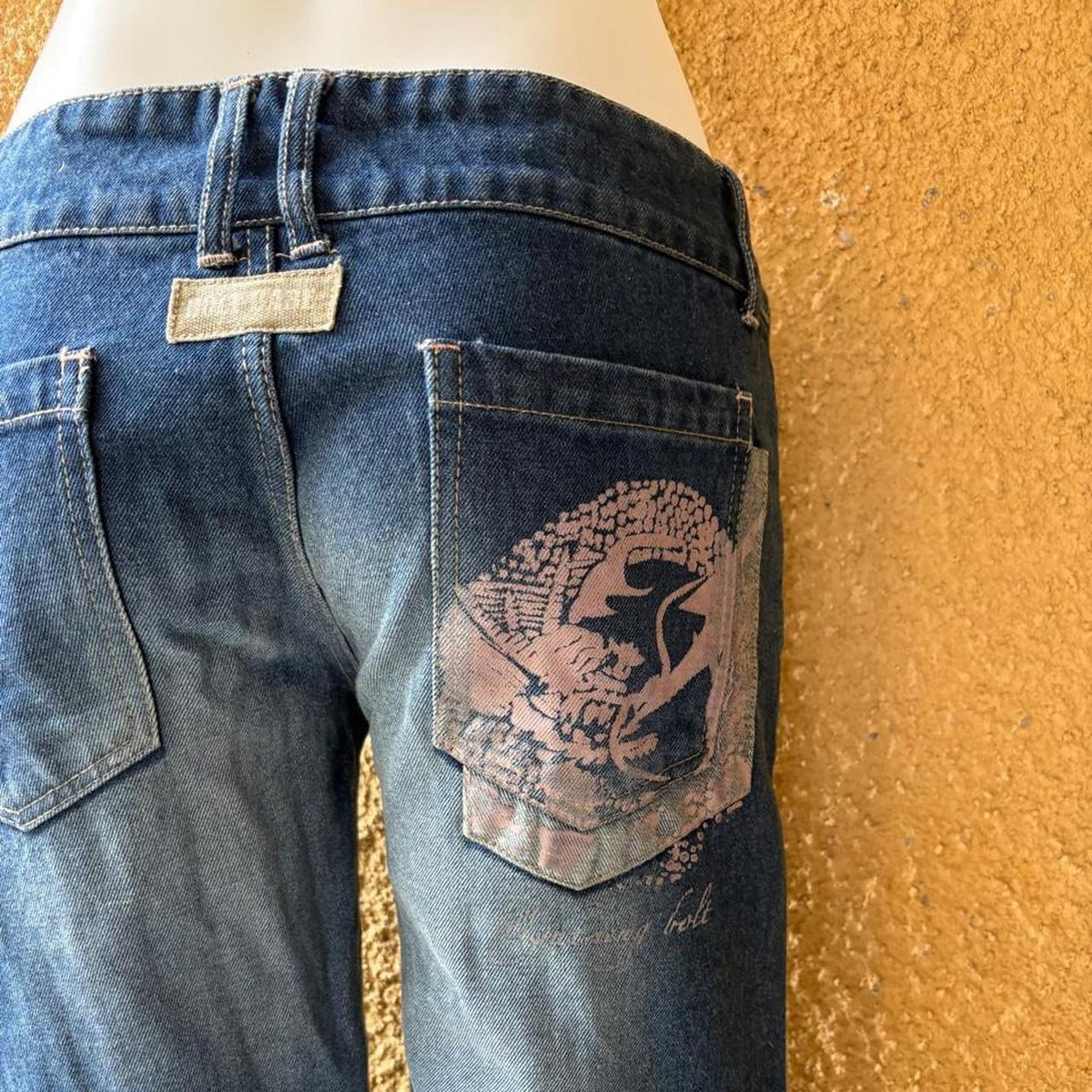 vintage 2000s y2k graphic low rise bootcut jeans